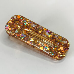 Barrette résine Polka dots gold.