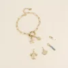 Cartelette SUMMER VIBES Bracelet et 6 pendentifs (coquillage escargot et étoile de mer). - Image 2