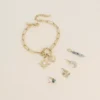 Cartelette WITH LOVE Bracelet et 6 pendentifs (étoile avec boule de résine et coeur).