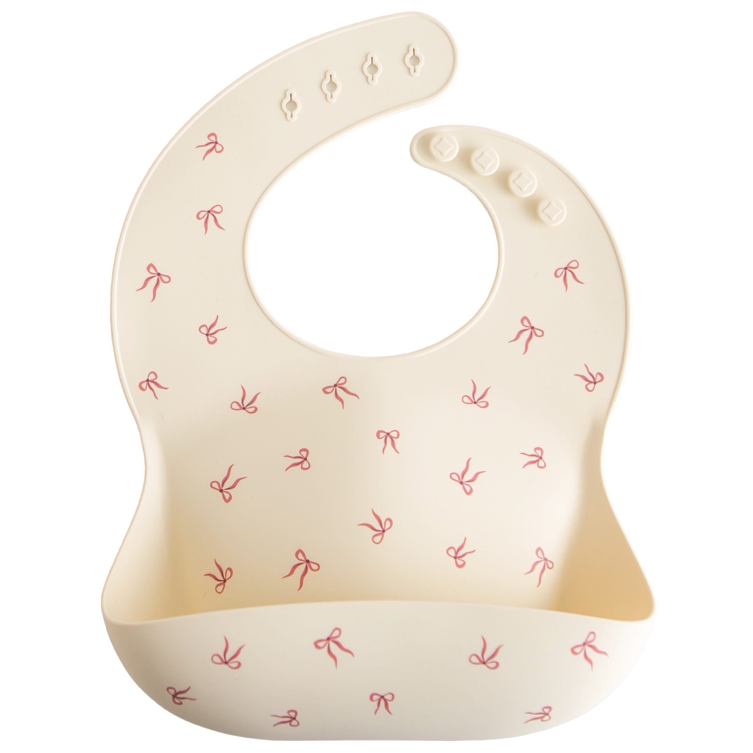 Bavoir en silicone Mushie  » Bows « .