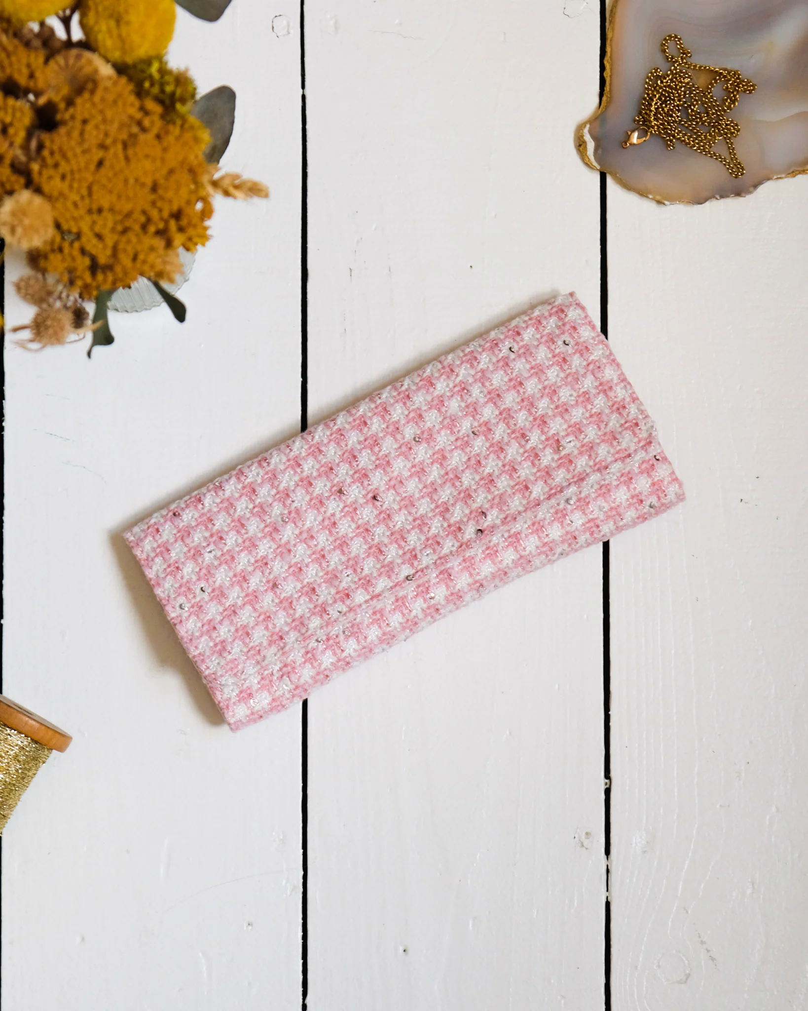 Pochette à bijoux Catherine en pied-de-poule rose.