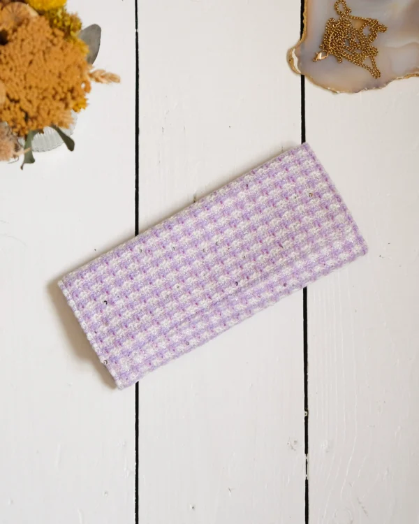 Pochette à bijoux Catherine en pied-de-poule mauve.