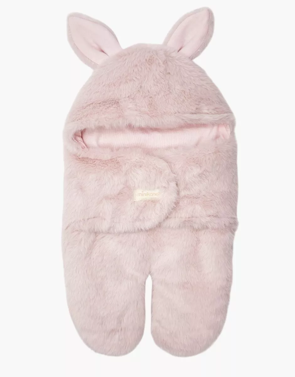 Minikane Chancelière poussette poupée Jeannot en fausse fourrure rose.